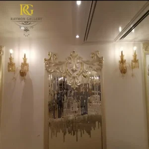 دیوارکوب 2 شاخه بلور طلایی و آویزهای زنگوله ای