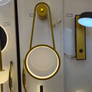 دیوارکوب مدرن طلایی و قاب دایره‌ای آویز