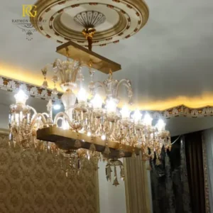 لوستر خطی باکارات طلایی مستطیلی با آویز های زنگوله ای