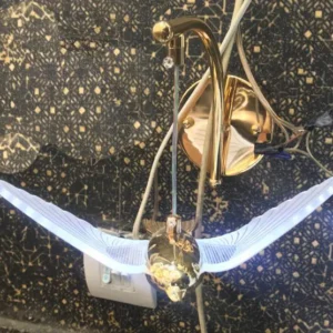 دیوارکوب طلایی مدرن با طرح پرنده